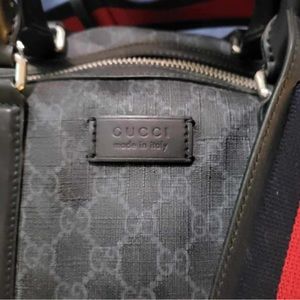 Gucci black carry-on duffle bag